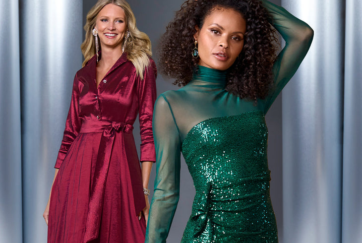 Two women wearing bold and elegant Boston Proper outfits, including a red satin shirtdress and a green sequined dress with sheer sleeves.